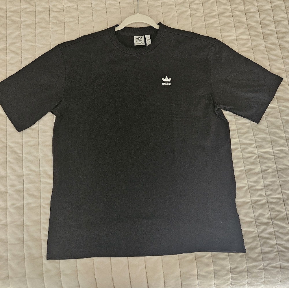 ADIDAS black tee shirt with colorful logo on the back